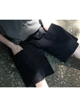 preto solto Japonês pessoal de design de bolso pequeno design casual sentido de cinco centavos calças da moda